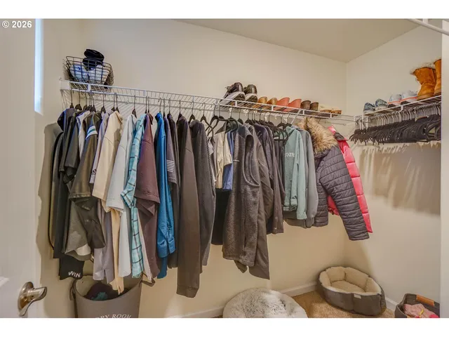 a bathroom with a sink vanity mirror and toilet