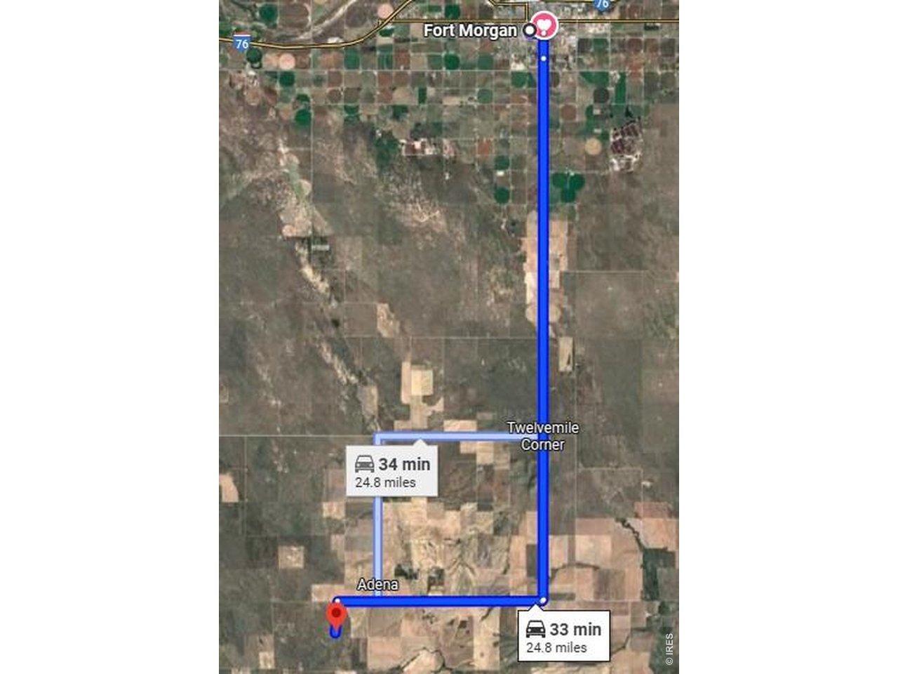 16300 Monnahan Road Fort Morgan, CO 80701 - Photo 5 of 7 a street sign on a wall next to road