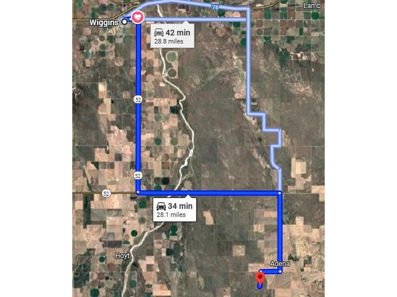 16300 Monnahan Road Fort Morgan, CO 80701 - Photo 6 of 7 a street sign on a wall next to a building