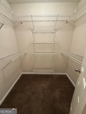 a view of a room with racks on the wall