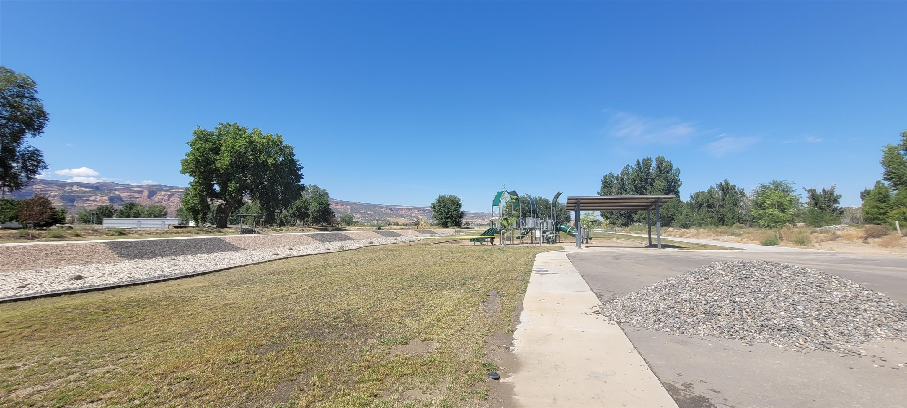 1674 Tungsten Way Fruita, CO 81521 - Photo 11 of 17 a view of a yard along with trees