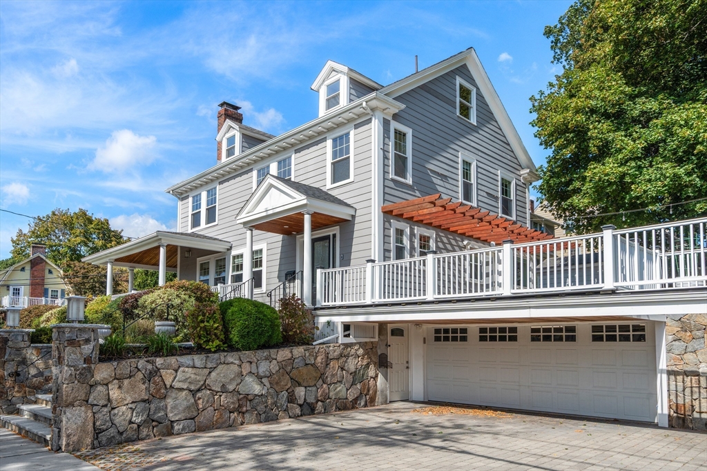 152 Bellevue Road Watertown, MA 02472 - Photo 2 of 42 a house view with a garden space