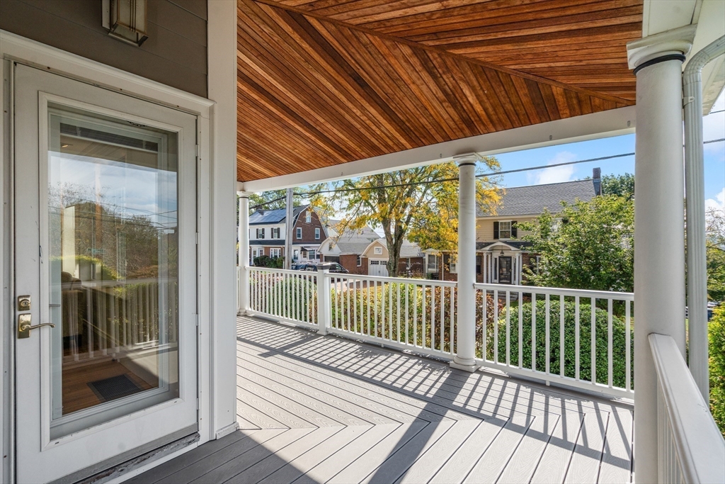152 Bellevue Road Watertown, MA 02472 - Photo 34 of 42 a view of a balcony with wooden floor