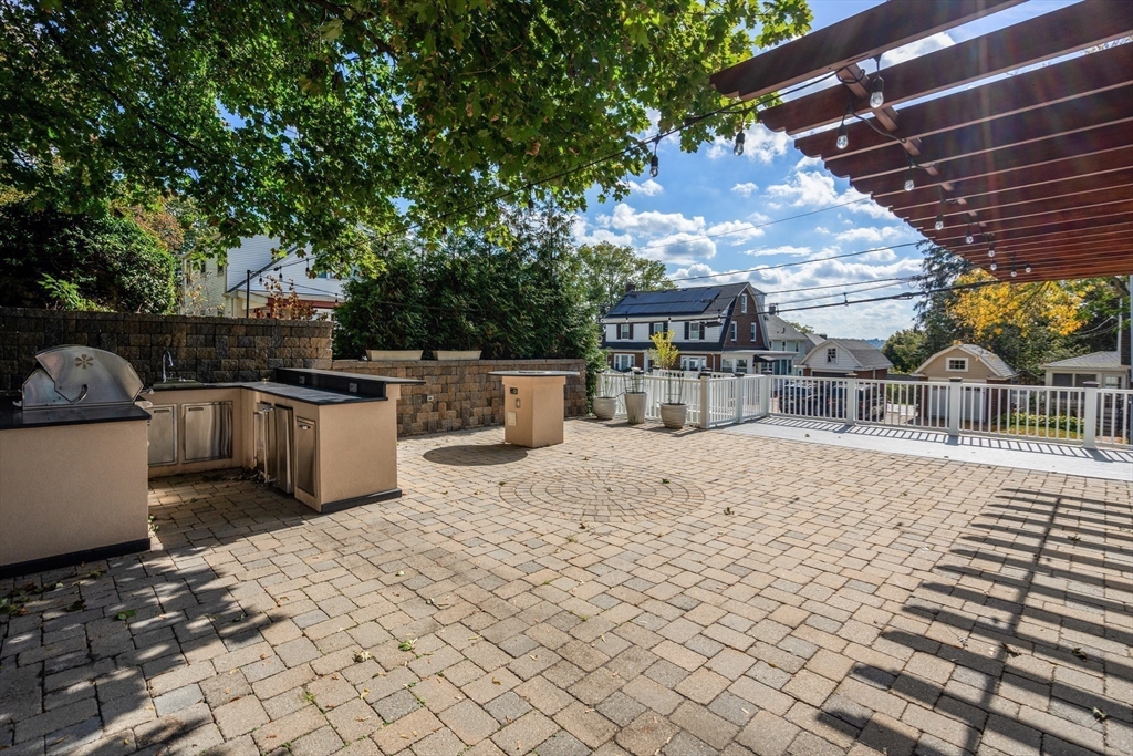 152 Bellevue Road Watertown, MA 02472 - Photo 39 of 42 a outdoor space with a barbeque
