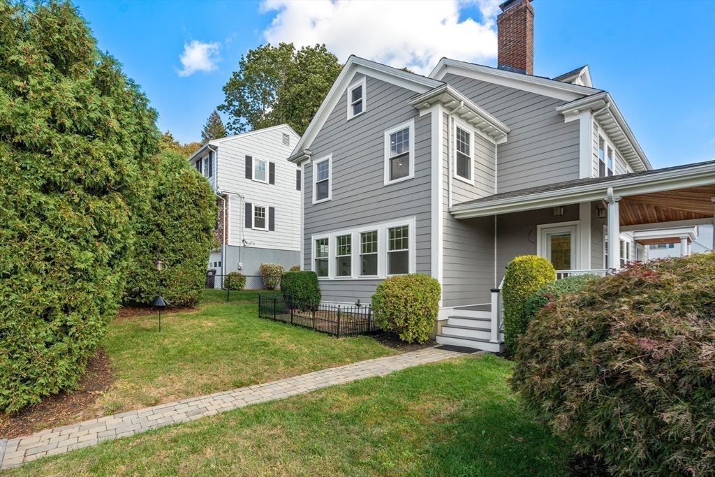 152 Bellevue Road Watertown, MA 02472 - Photo 41 of 42 a front view of a house with a yard