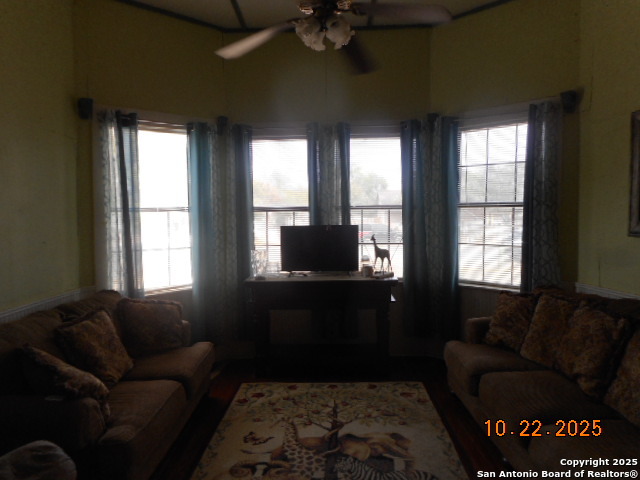 1212 Magnolia Street Jourdanton, TX 78026 - Photo 6 of 14 a living room with furniture and a window