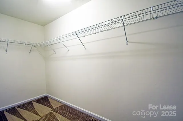 a view of a room with racks on the wall