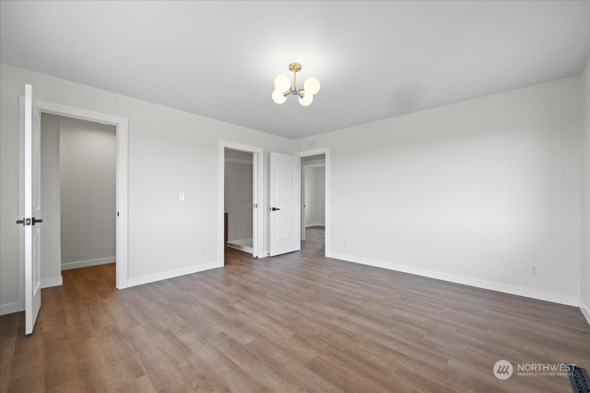 465 South Lemaster Road Othello, WA 99344 - Photo 28 of 40 a view of an empty room with wooden floor
