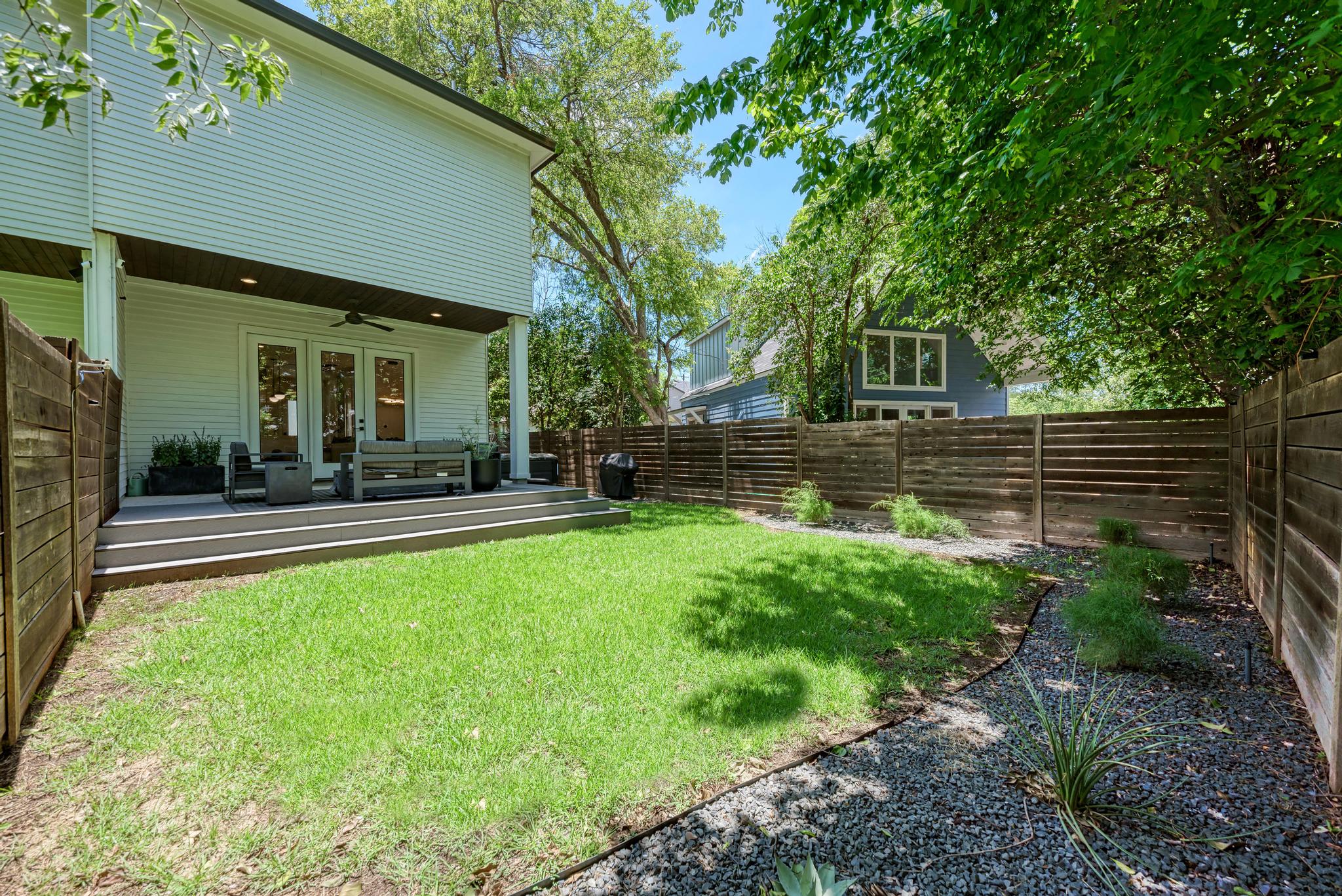918 Cardinal Lane, Unit A Austin, TX 78704 - Photo 31 of 40 The perfect amount of irrigated lawn space for pets and play without too much to upkeep.
