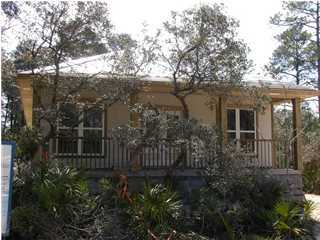Lot 16 Spotted Dolphin Road Santa Rosa Beach, FL 32459 - Photo 1 of 1 a view of a house with backyard and garden