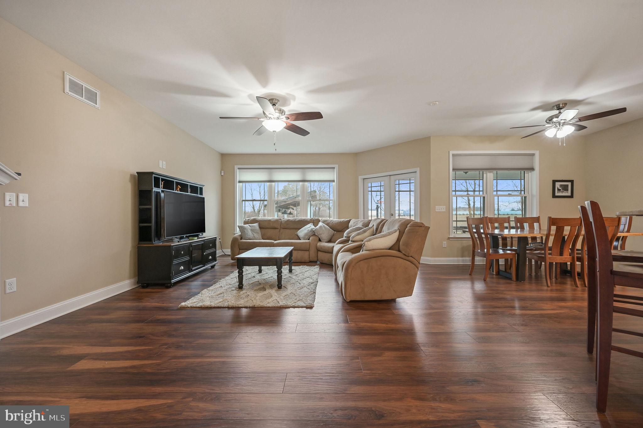 321 Blue Heron Road Dover, DE 19904 - Photo 11 of 47 a living room with fireplace furniture and a flat screen tv