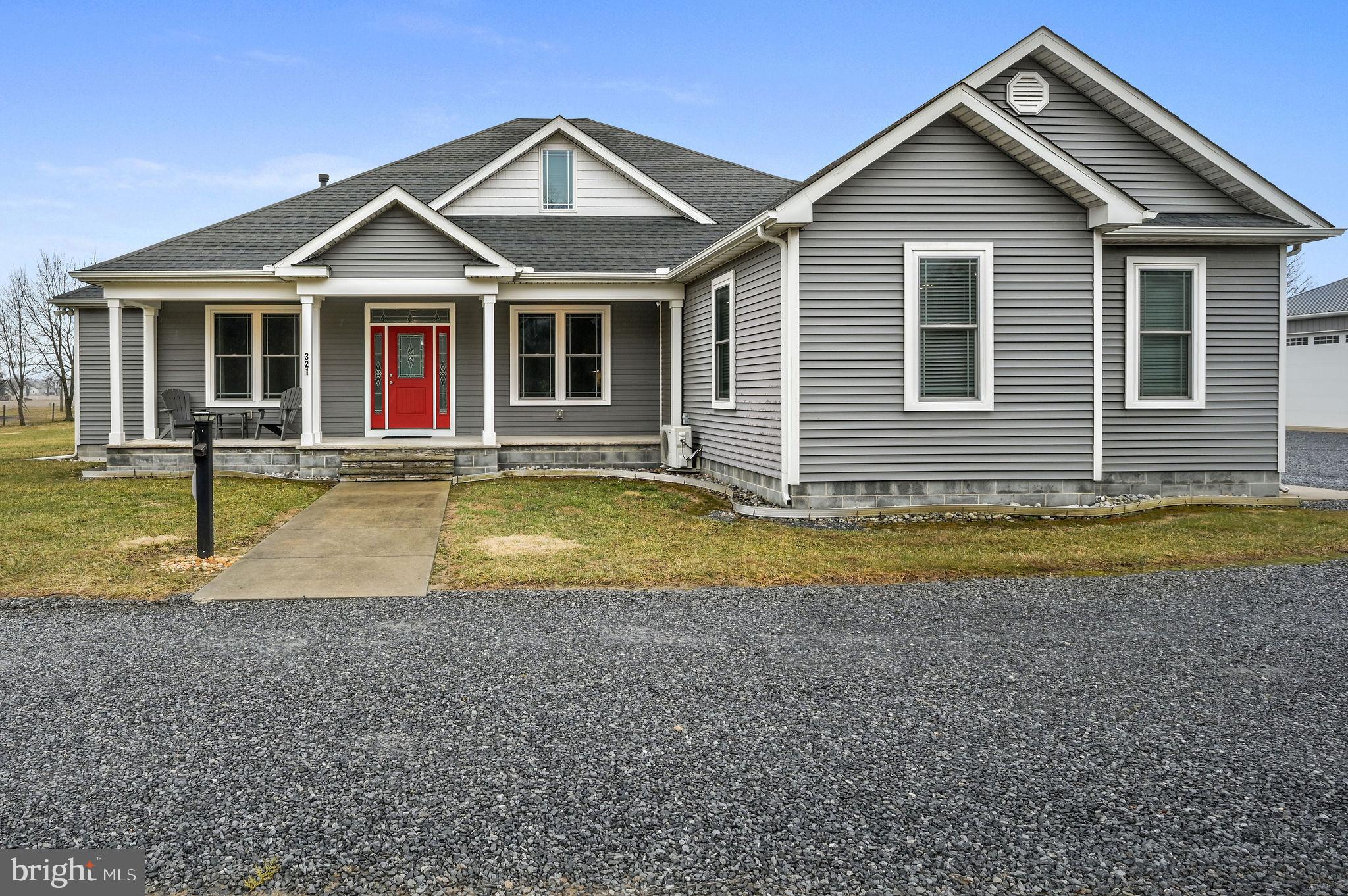 321 Blue Heron Road Dover, DE 19904 - Photo 2 of 47 a view of a house with a swimming pool