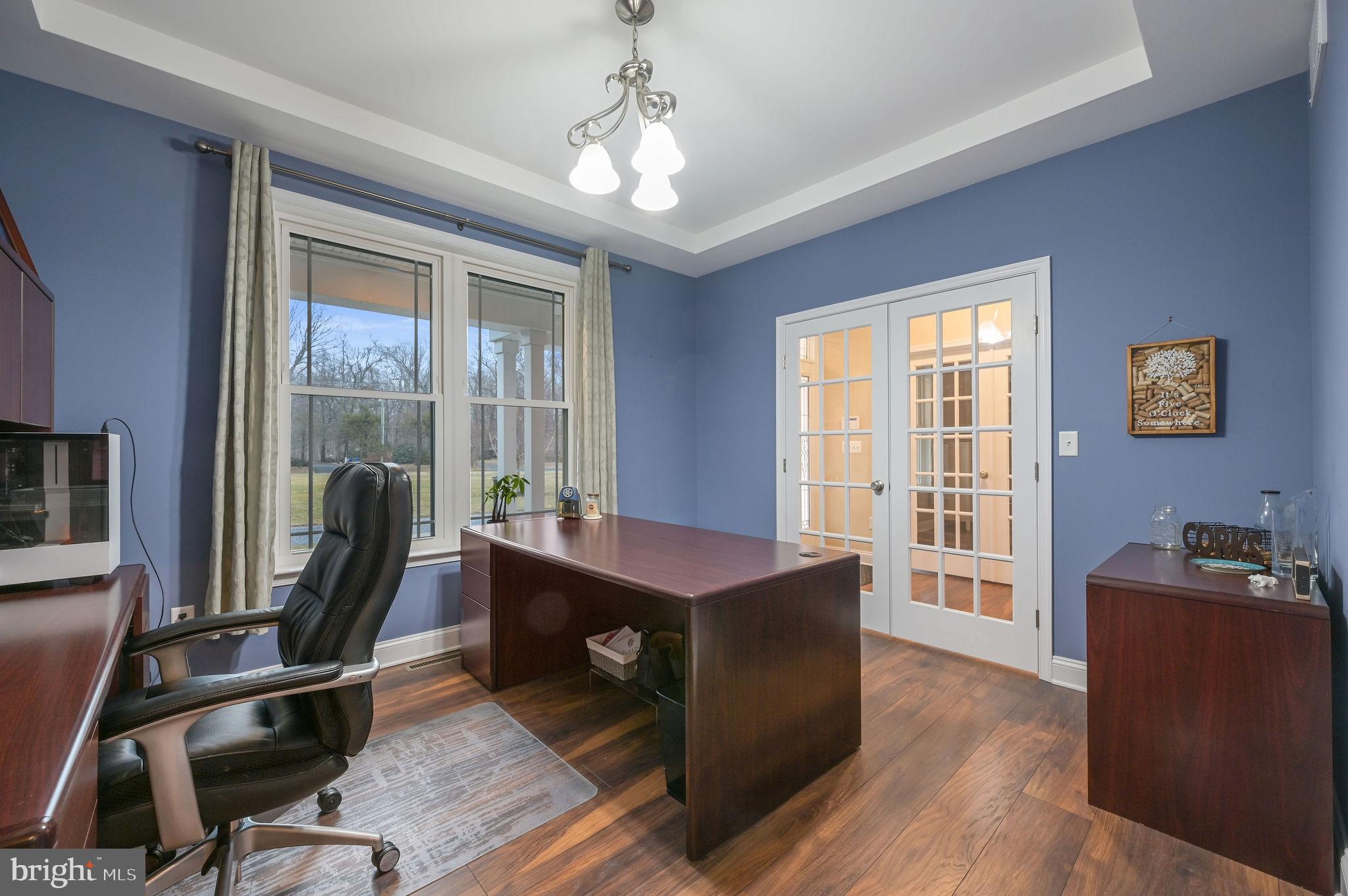 321 Blue Heron Road Dover, DE 19904 - Photo 27 of 47 a room with furniture pool table wooden floor and windows
