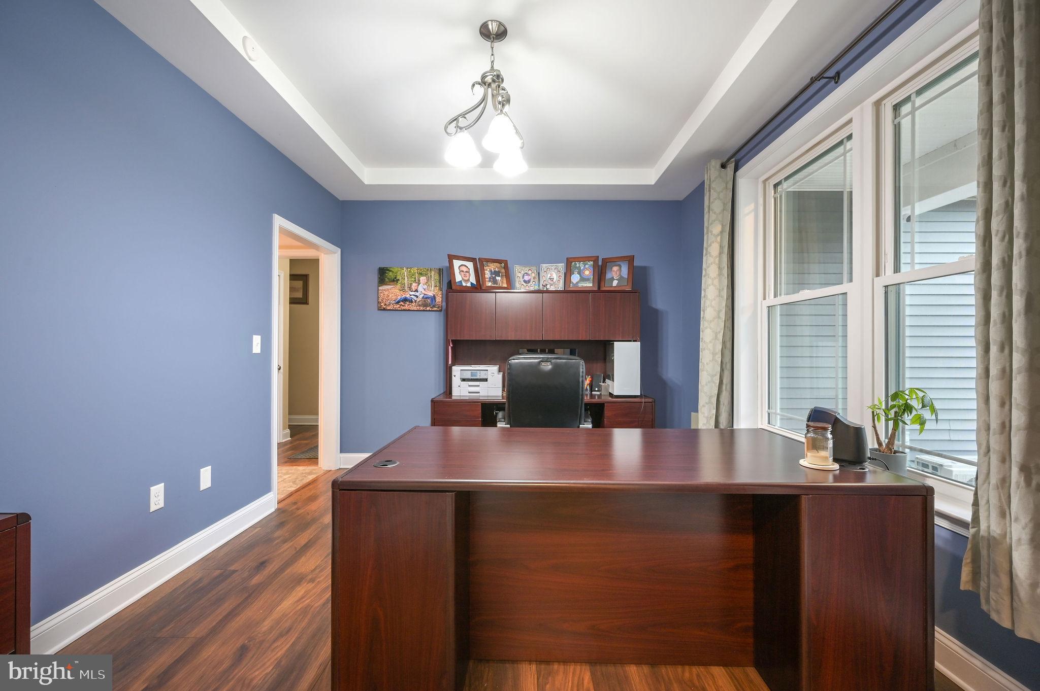 321 Blue Heron Road Dover, DE 19904 - Photo 28 of 47 a living room with furniture and a flat screen tv