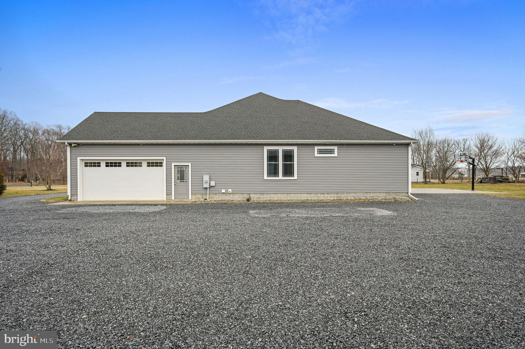 321 Blue Heron Road Dover, DE 19904 - Photo 3 of 47 a house view with a outdoor space