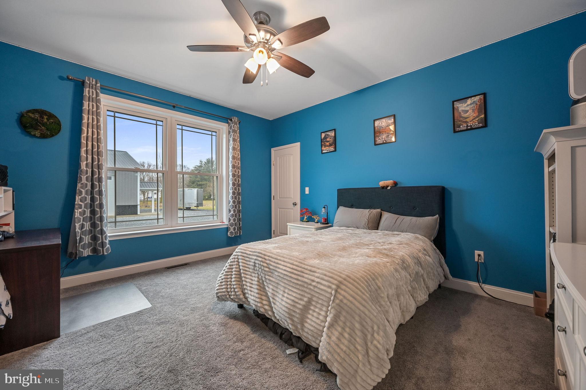 321 Blue Heron Road Dover, DE 19904 - Photo 33 of 47 a bedroom with bed and window