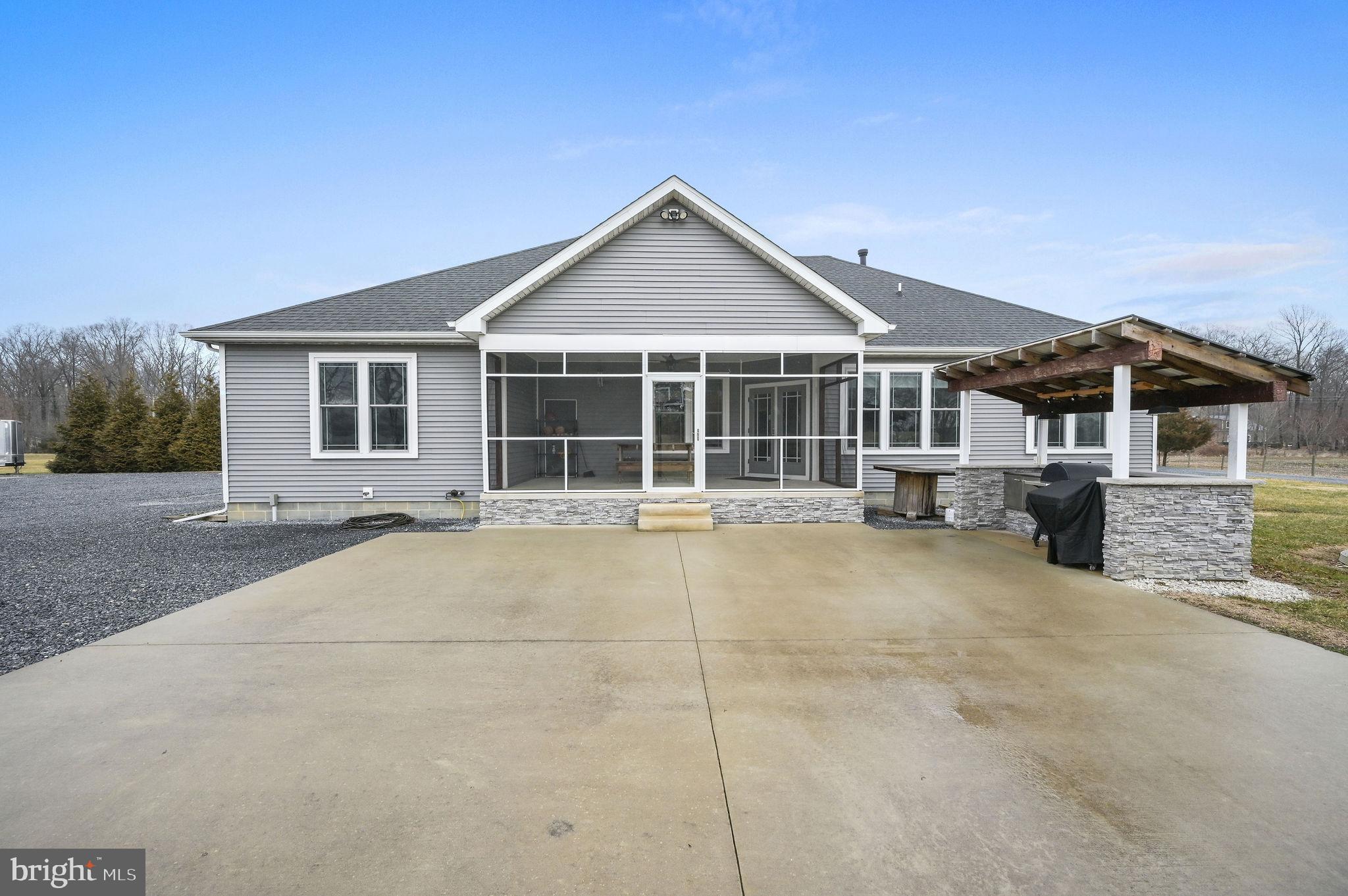 321 Blue Heron Road Dover, DE 19904 - Photo 5 of 47 front view of a house with a yard