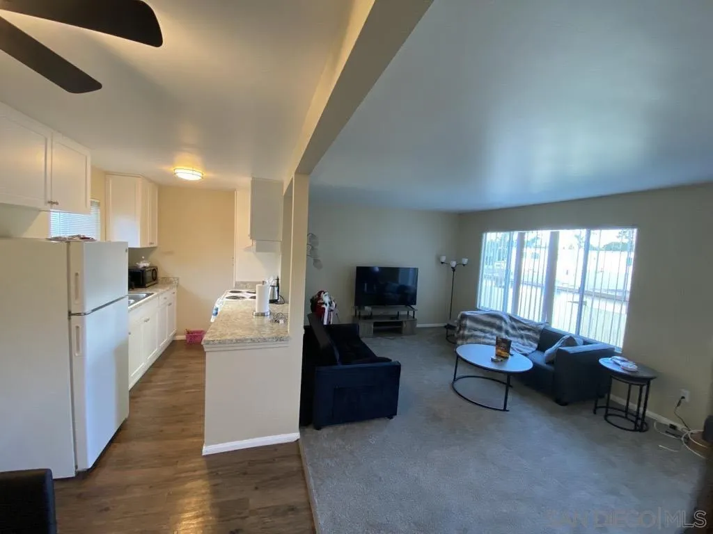 181 Ballantyne Street El Cajon, CA 92020 - Photo 13 of 13 a living room with furniture and a flat screen tv
