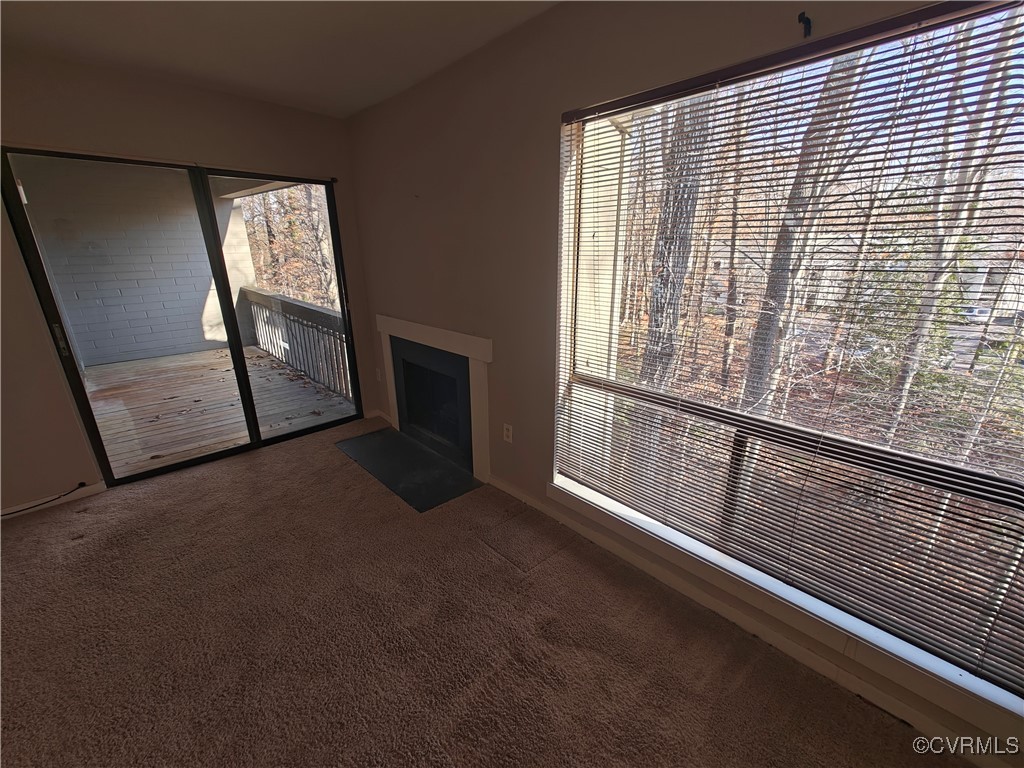 10258 Iron Mill Road North Chesterfield, VA 23235 - Photo 6 of 20 Unfurnished living room with carpet floors