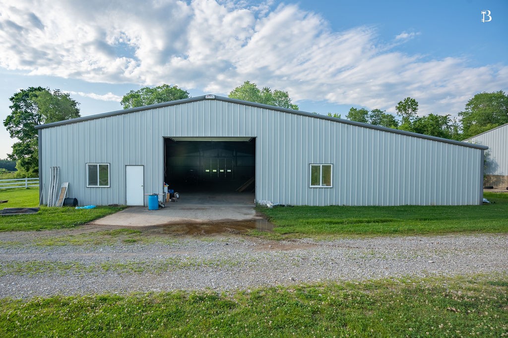 400 McIntosh Chapel Road Nortonville, KY 42442 - Photo 11 of 15 a backyard of a house with lots of green space