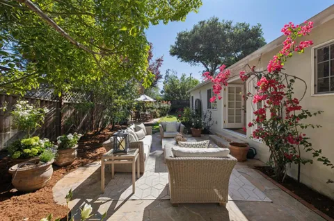 a backyard of a house with lots of green space