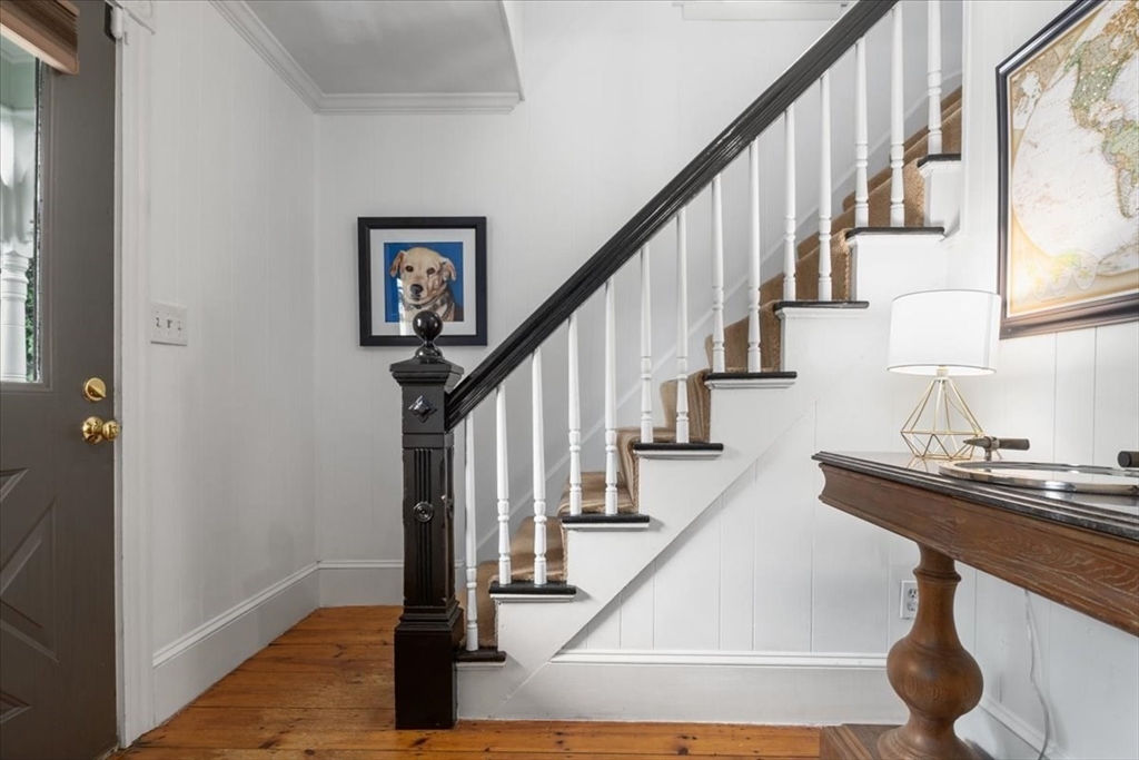 265 Sutton Street North Andover, MA 01845 - Photo 15 of 27 a view of entryway and hall with wooden floor