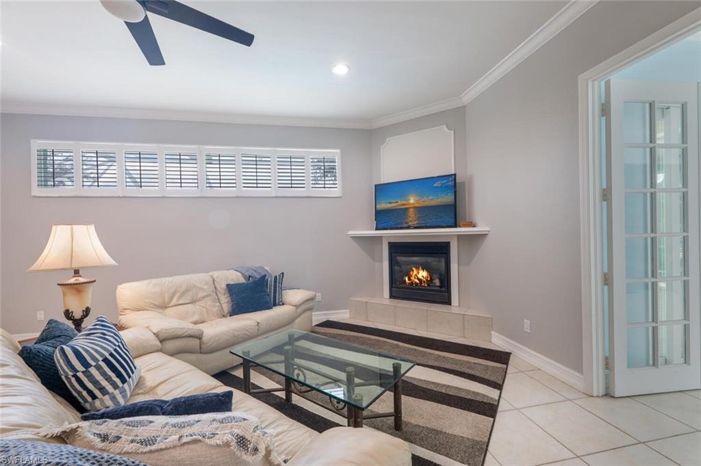 9974 Boca Avenue North Naples, FL 34109 - Photo 21 of 42 a living room with furniture