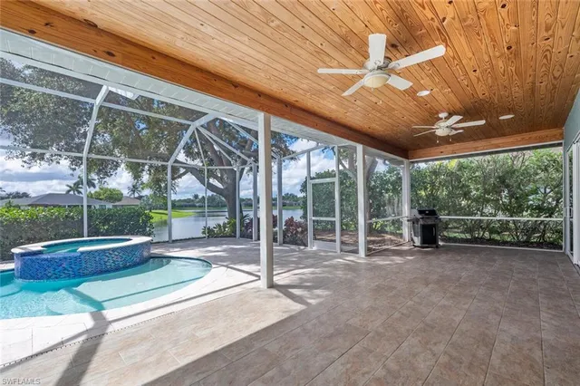 a view of a house with backyard and porch