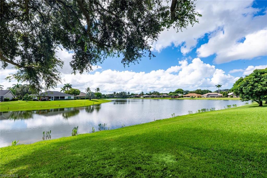9974 Boca Avenue North Naples, FL 34109 - Photo 40 of 42 a view of a lake