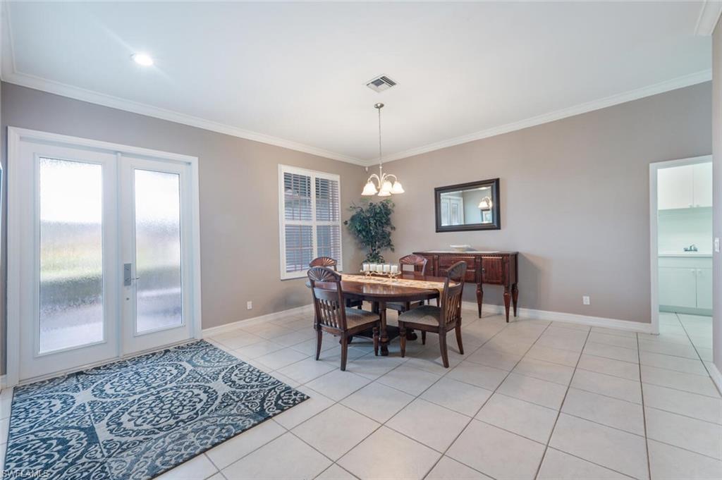 9974 Boca Avenue North Naples, FL 34109 - Photo 9 of 42 a view of a livingroom with furniture and window