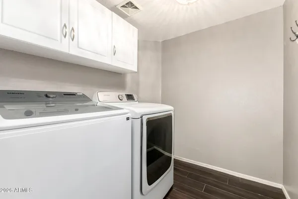 a view of a house with a street