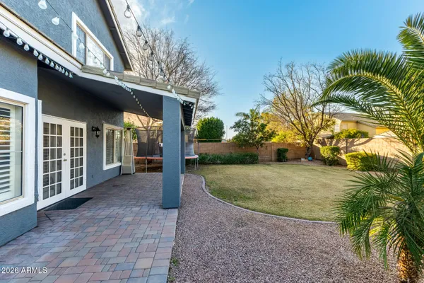 a view of a house with swimming pool