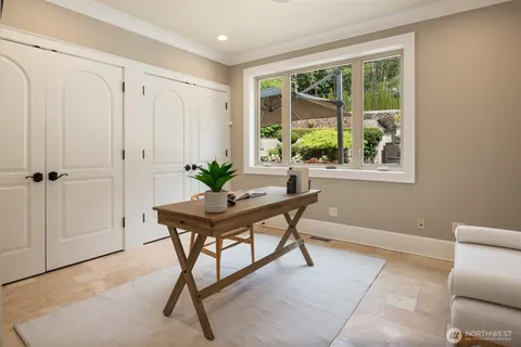 a view of a livingroom with furniture and window