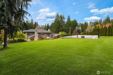 a view of a house with a big yard