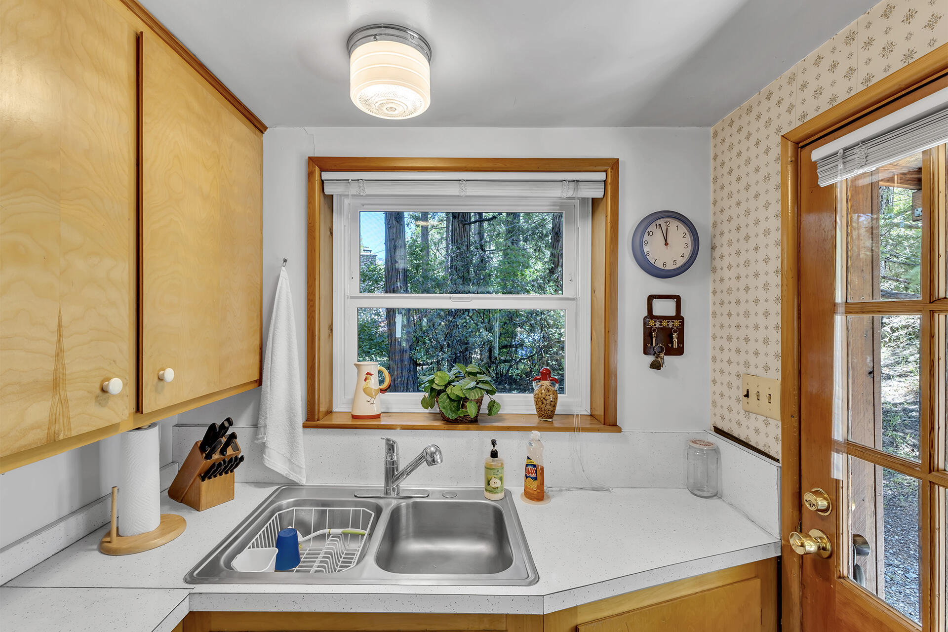 26975 Idyllwild Road Idyllwild, CA 92549 - Photo 11 of 65 a bathroom with a sink and a window
