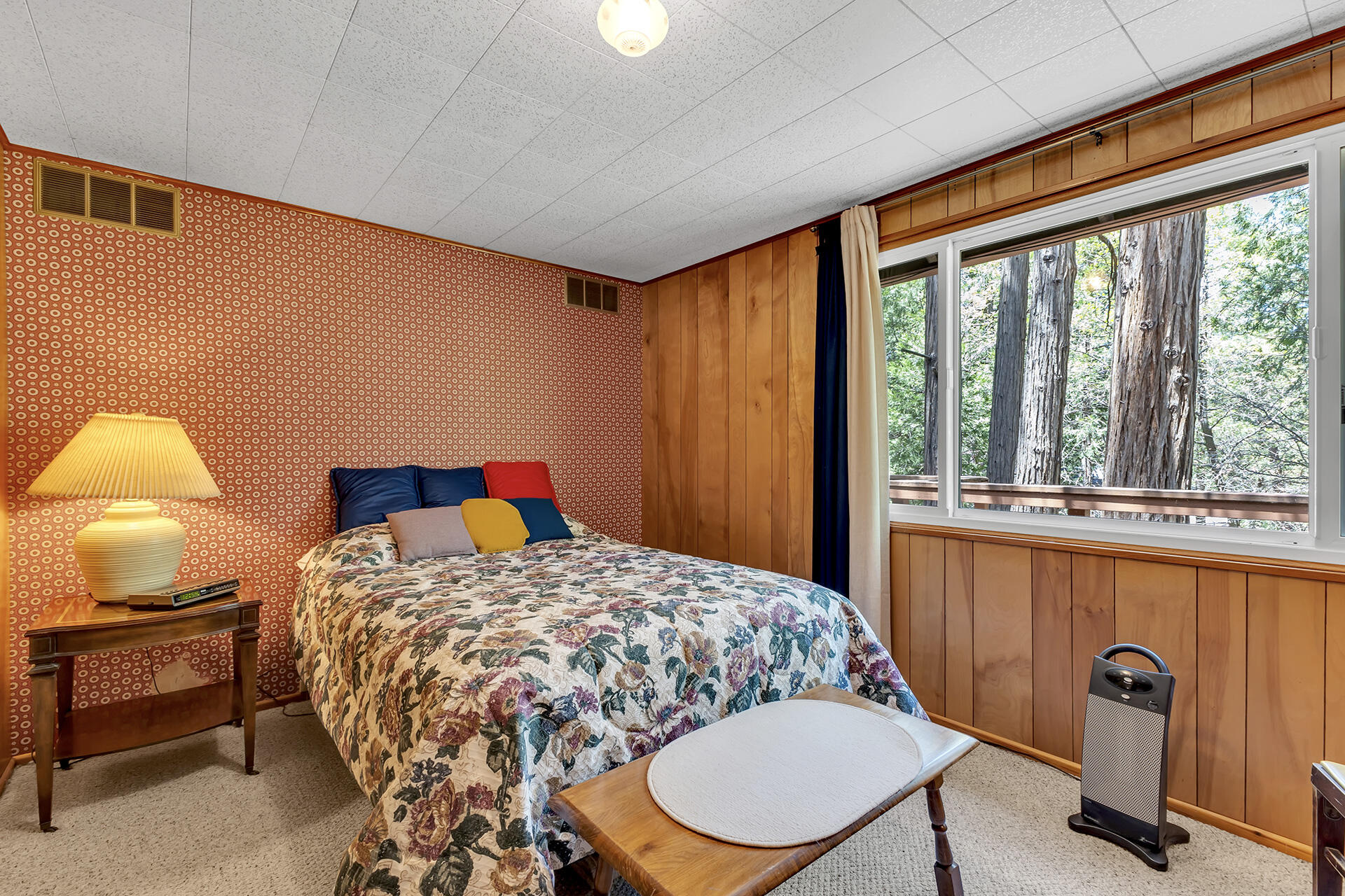 26975 Idyllwild Road Idyllwild, CA 92549 - Photo 31 of 65 a bed sitting in a bedroom next to a window