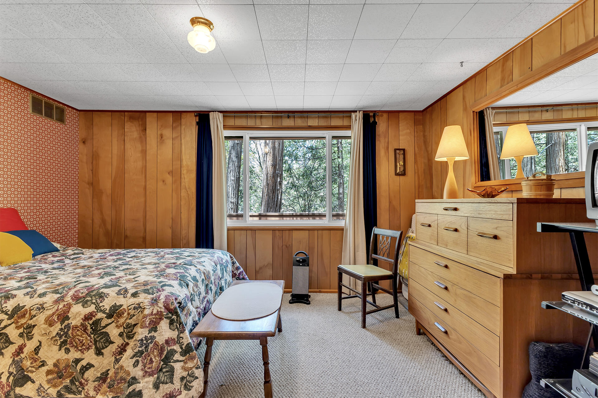 26975 Idyllwild Road Idyllwild, CA 92549 - Photo 32 of 65 a bedroom with a bed and large windows
