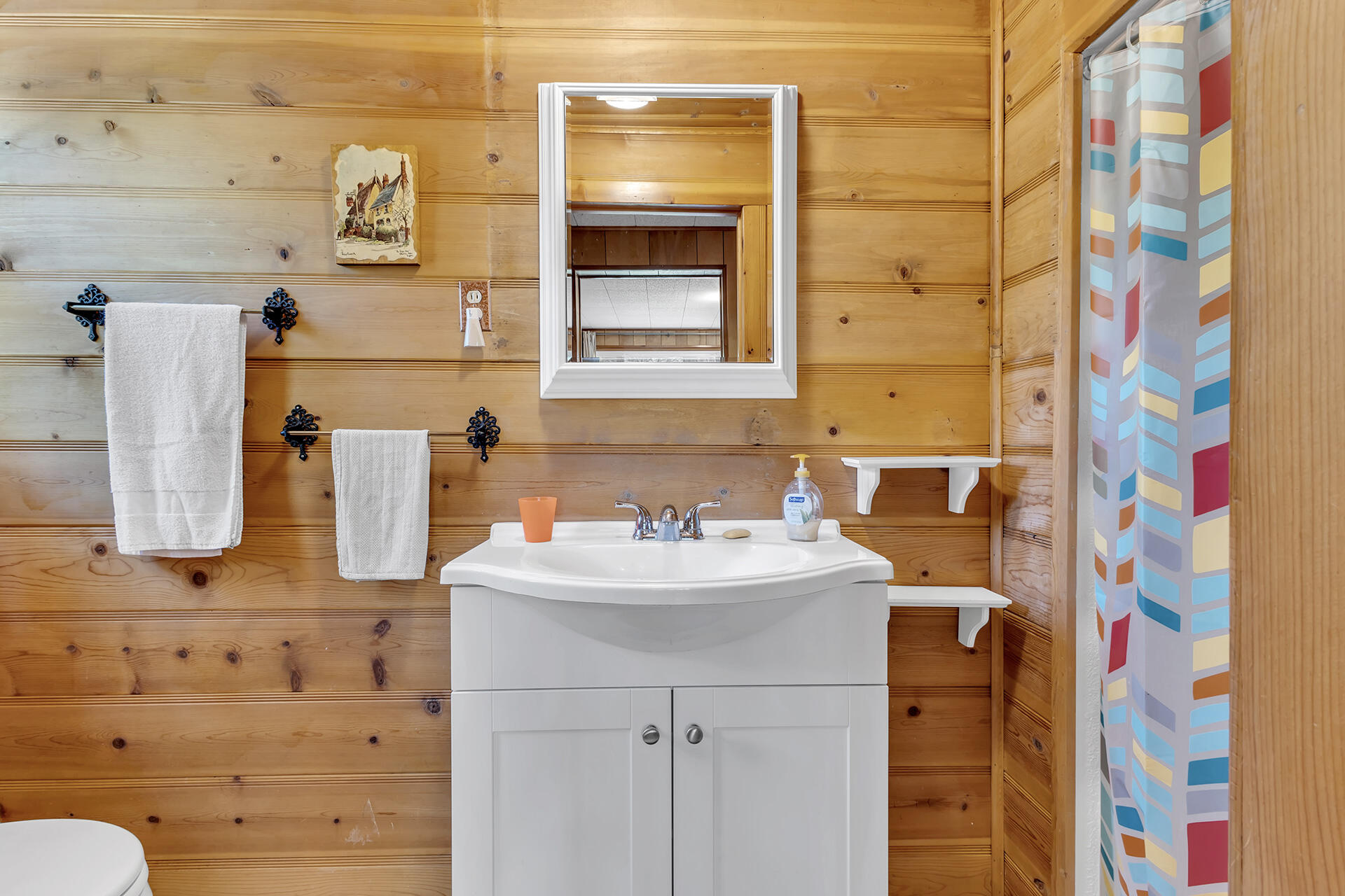 26975 Idyllwild Road Idyllwild, CA 92549 - Photo 34 of 65 a bathroom with a sink and a mirror