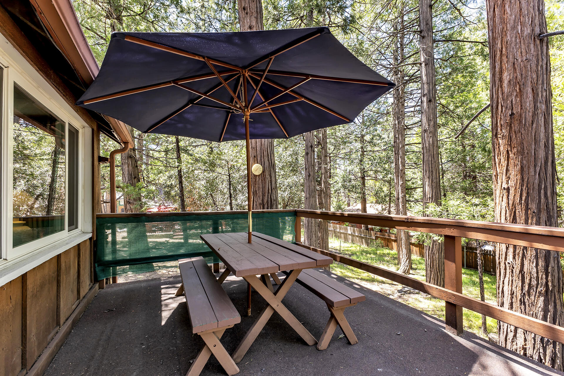 26975 Idyllwild Road Idyllwild, CA 92549 - Photo 41 of 65 a view of deck with furniture and umbrella