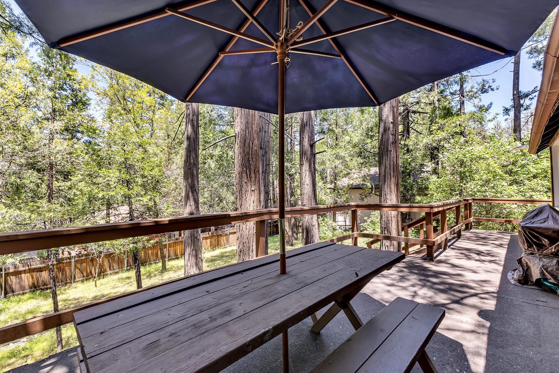 26975 Idyllwild Road Idyllwild, CA 92549 - Photo 42 of 65 a view of balcony with furniture and umbrella