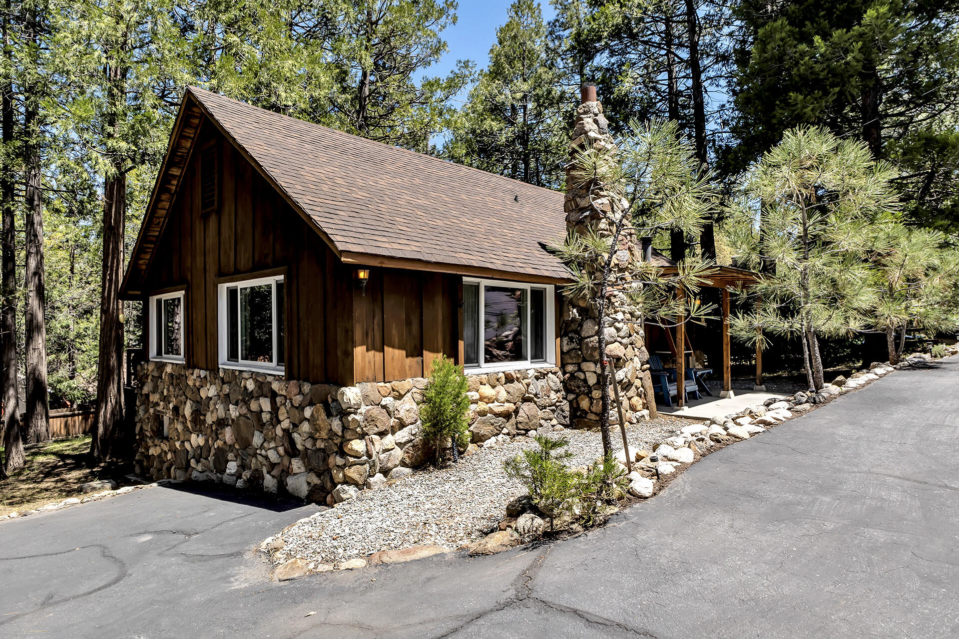26975 Idyllwild Road Idyllwild, CA 92549 - Photo 5 of 65 a front view of a house with a garden