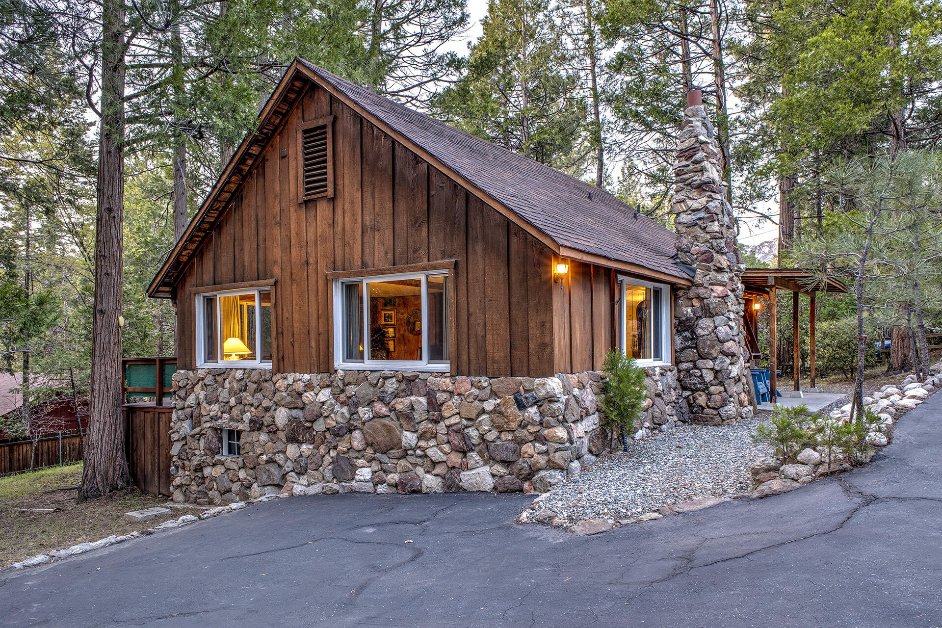 26975 Idyllwild Road Idyllwild, CA 92549 - Photo 55 of 65 a view of a house with a yard plants and large tree