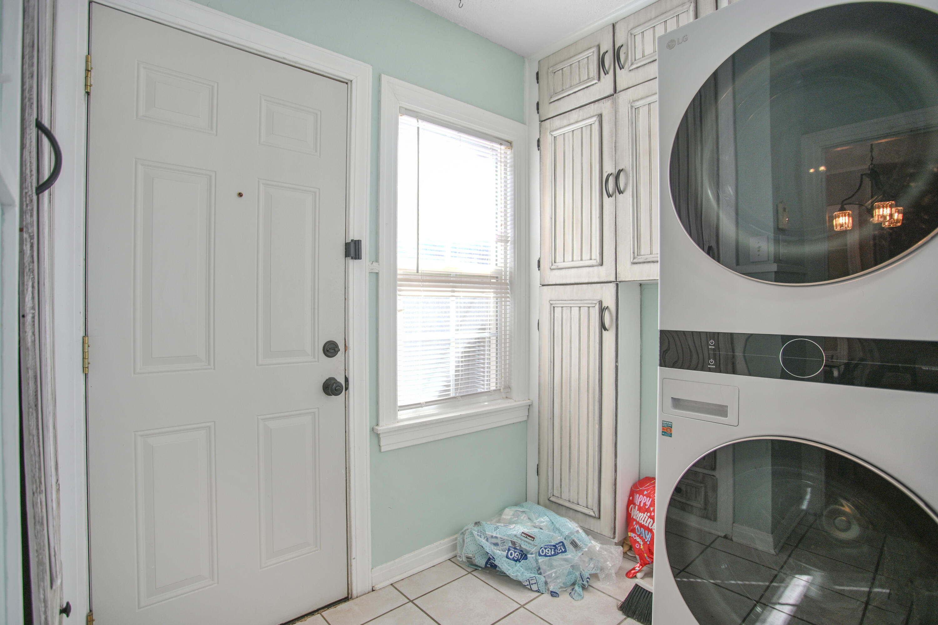 3013 28th Street Lubbock, TX 79410 - Photo 15 of 38 a bathroom with a sink and mirror