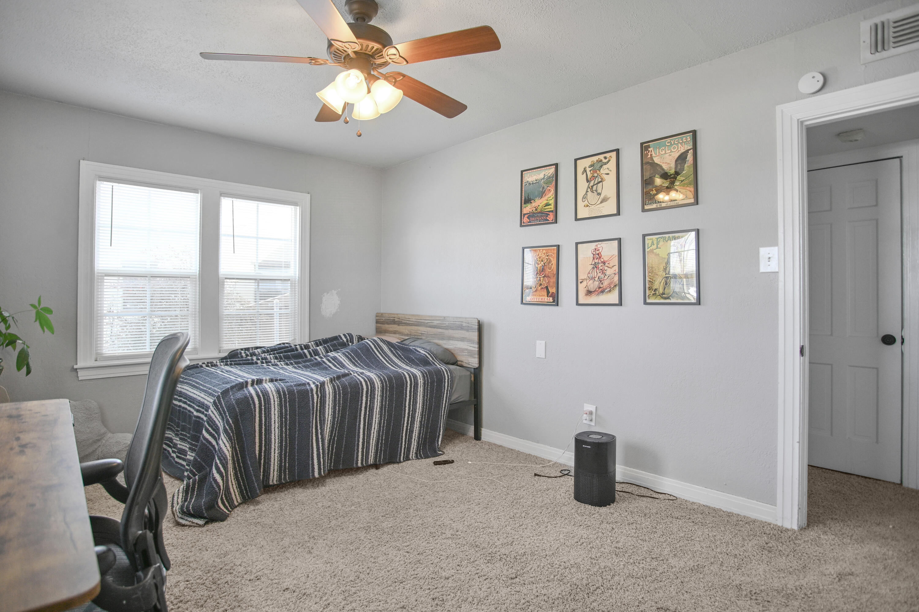 3013 28th Street Lubbock, TX 79410 - Photo 31 of 38 a bedroom with a bed and a window