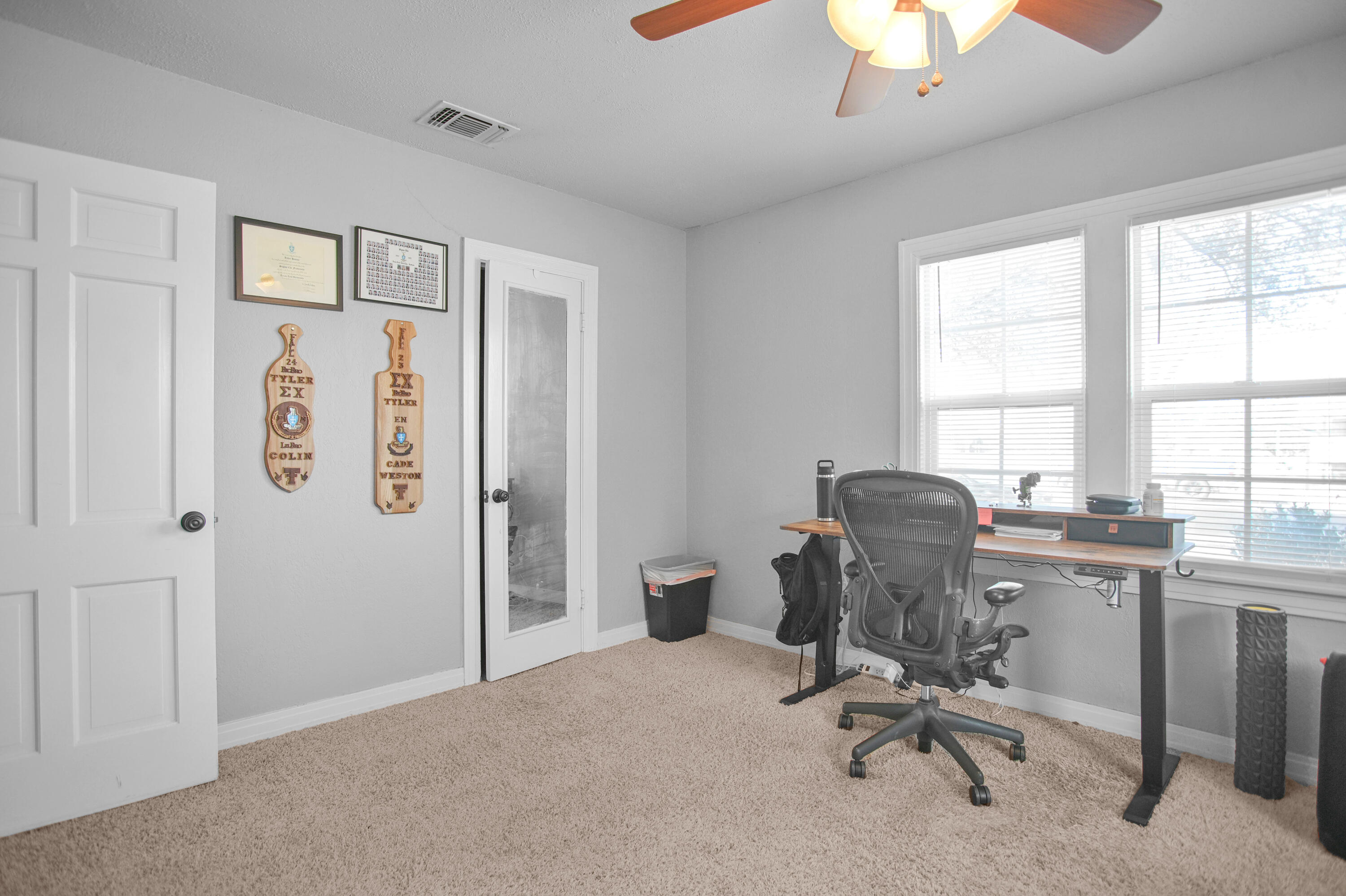 3013 28th Street Lubbock, TX 79410 - Photo 33 of 38 a view of a workspace with furniture and a window