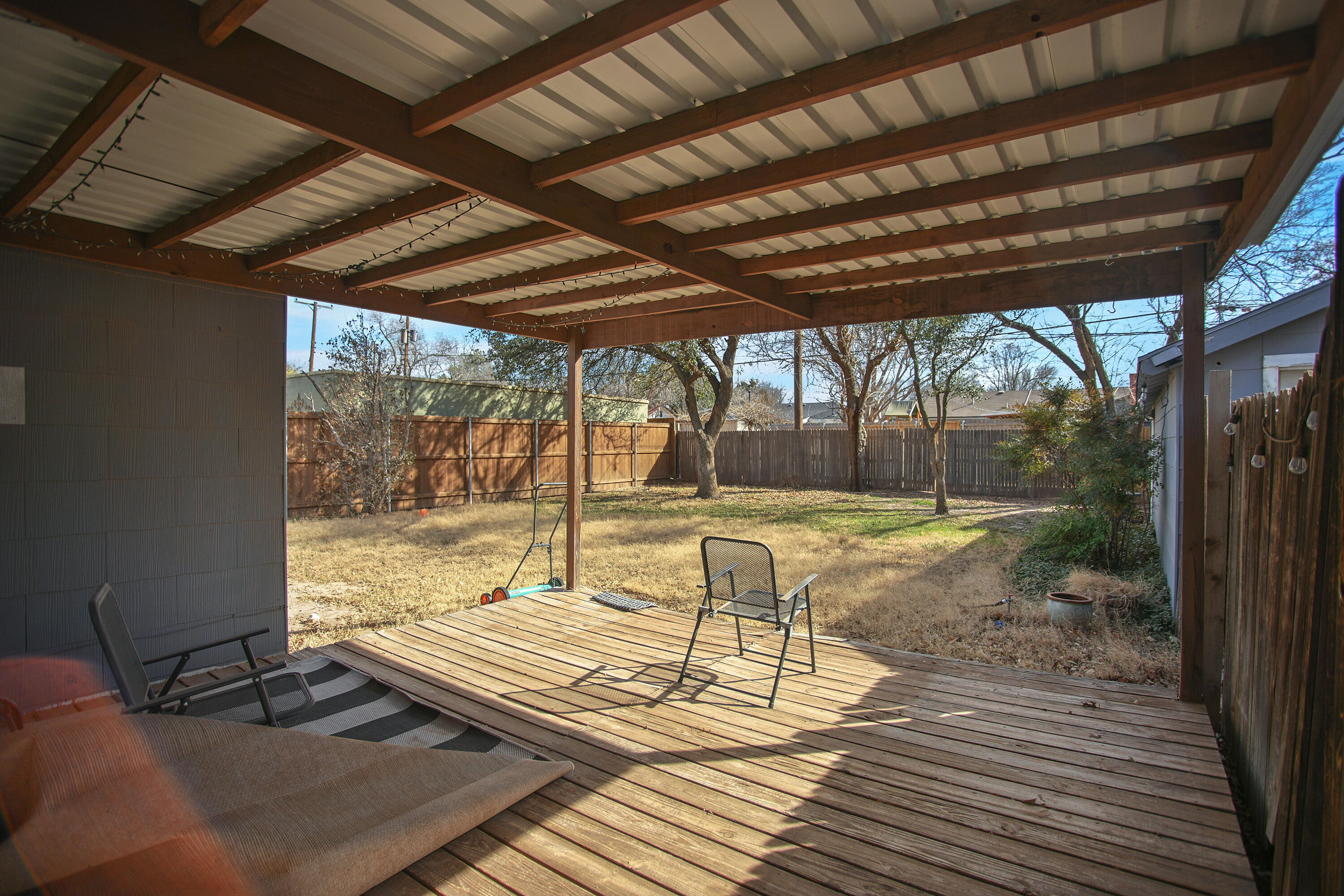 3013 28th Street Lubbock, TX 79410 - Photo 34 of 38 a swimming pool with a outdoor seating