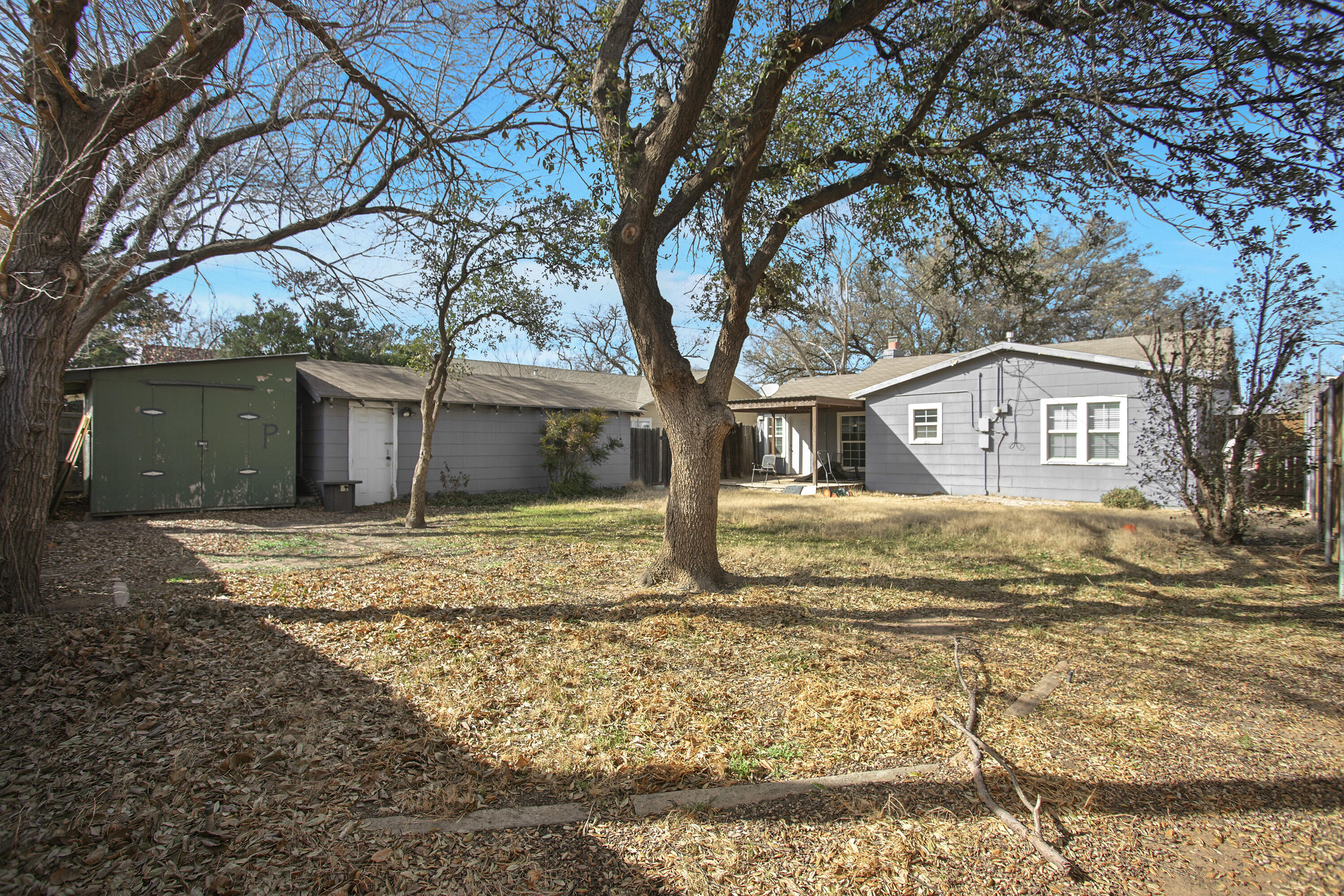 3013 28th Street Lubbock, TX 79410 - Photo 37 of 38 a house that has a tree in front of it