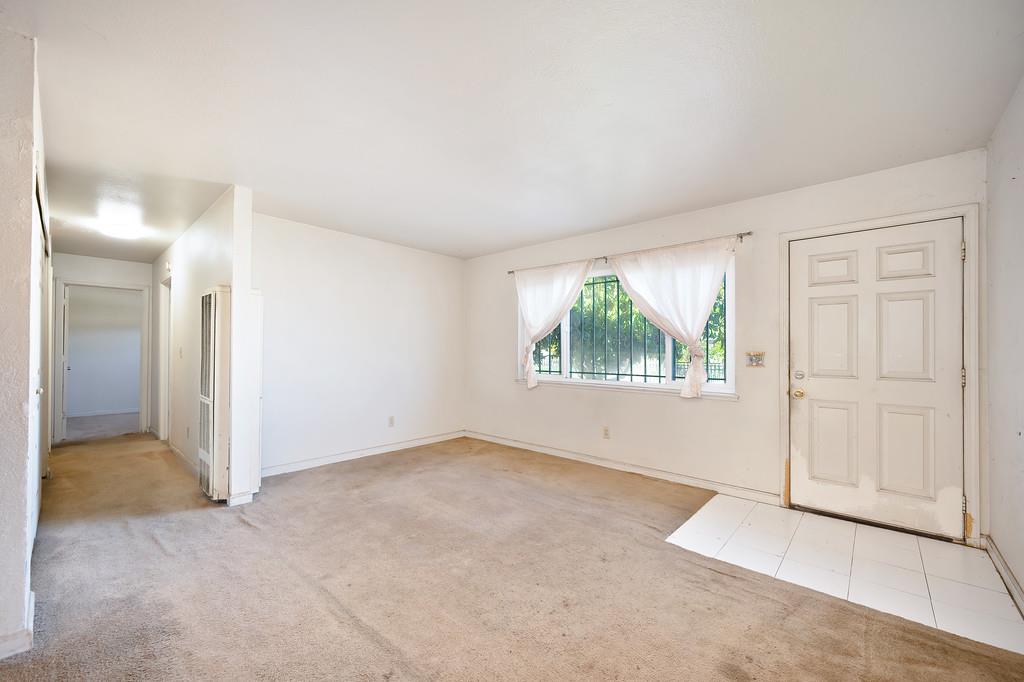 7580 Bellini Way Sacramento, CA 95828 - Photo 11 of 34 an empty room with windows