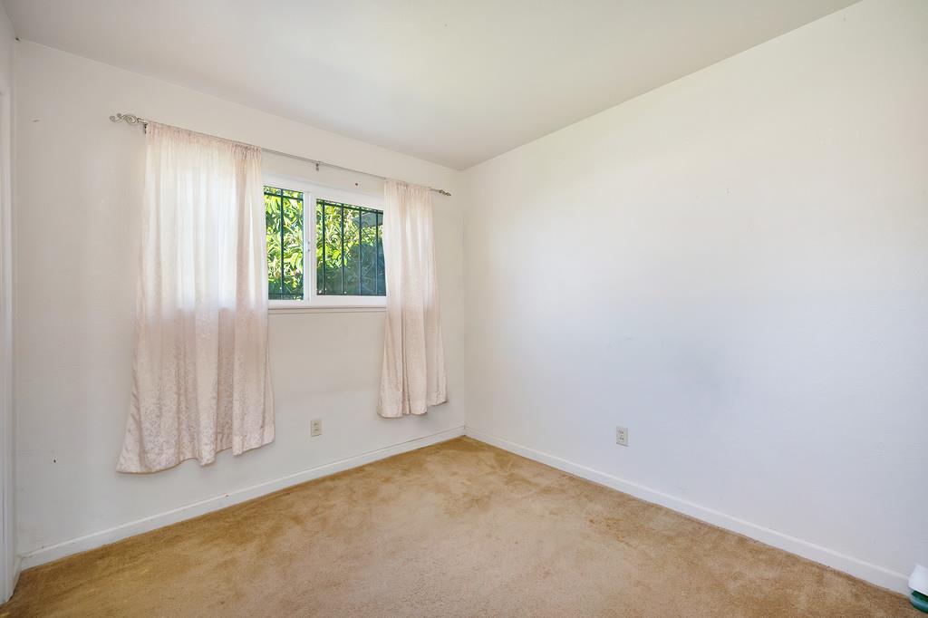 7580 Bellini Way Sacramento, CA 95828 - Photo 21 of 34 an empty room with a window