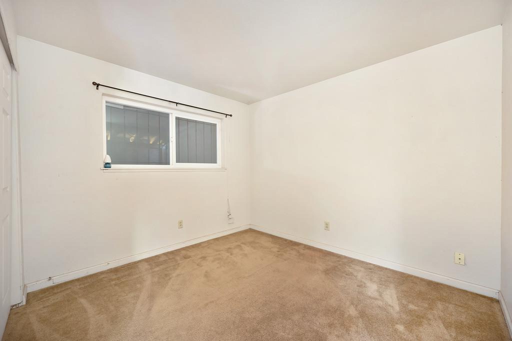 7580 Bellini Way Sacramento, CA 95828 - Photo 23 of 34 an empty room with a window